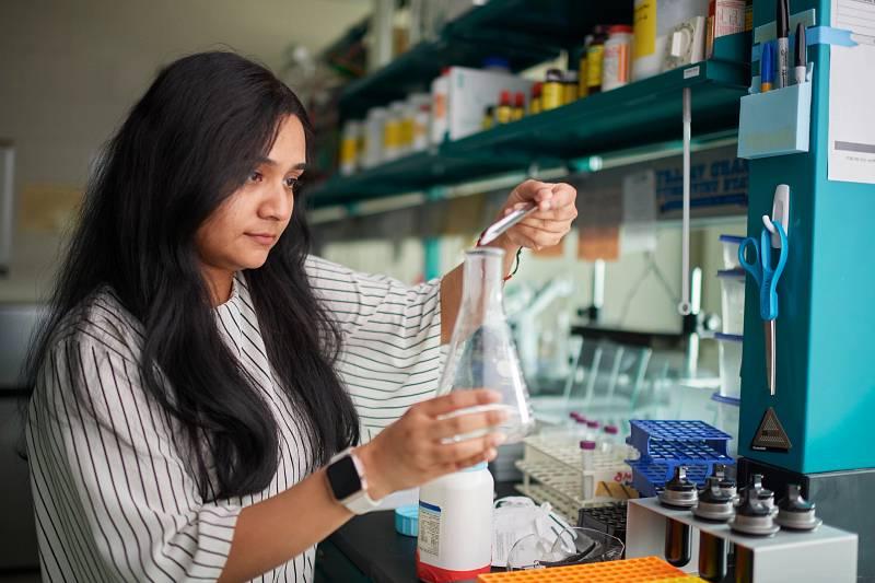 An International student working in a Chemistry lab at GVSU.